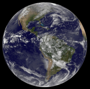 Image of the spherical earth showing North and South Americans. Looking at it from a two-dimensional perspective, the earth is a circle.